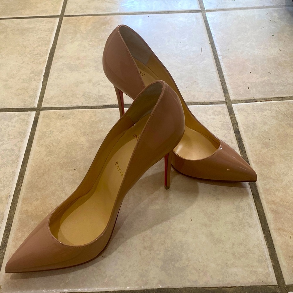 Worn once! Christian Louboutin Pigalle Follies Pointed Toe Pump.